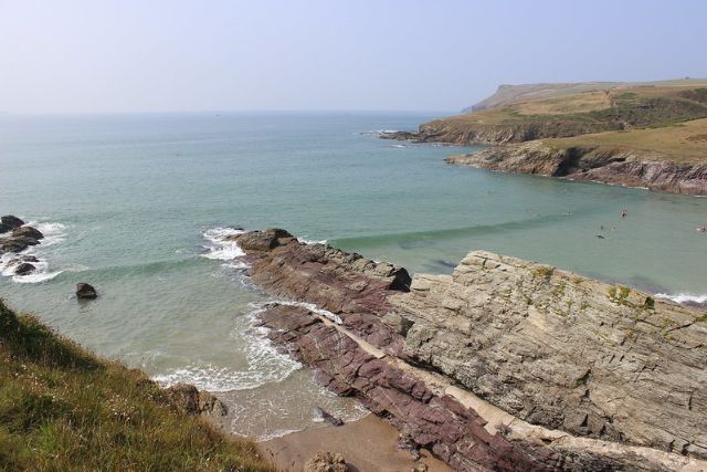 A view of Polzeath Beach from the cliffs in Polzeath, Cornwall.