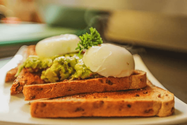 Avocado and eggs on toast at The Granary Restaurant in Wadebridge, Cornwall.