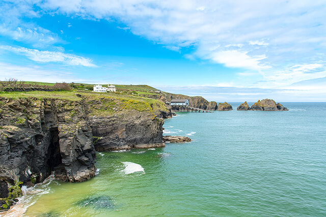 A view of Padstow RNLI Lifeboat station and the rocky cliffs.