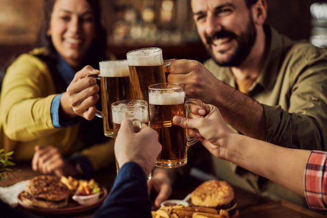 Friends toasting in a Pub